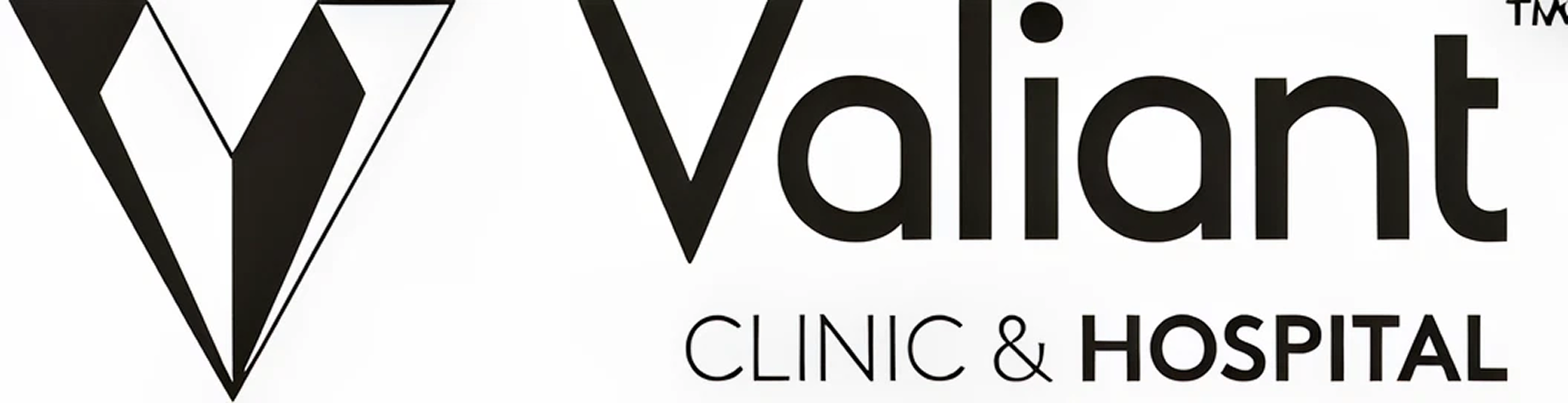 Valiant clinic and hospital logo